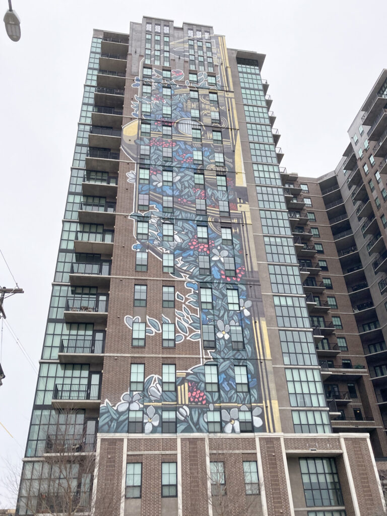 The Case Building in Deep Ellum, Texas covered in a beautiful floral mural.