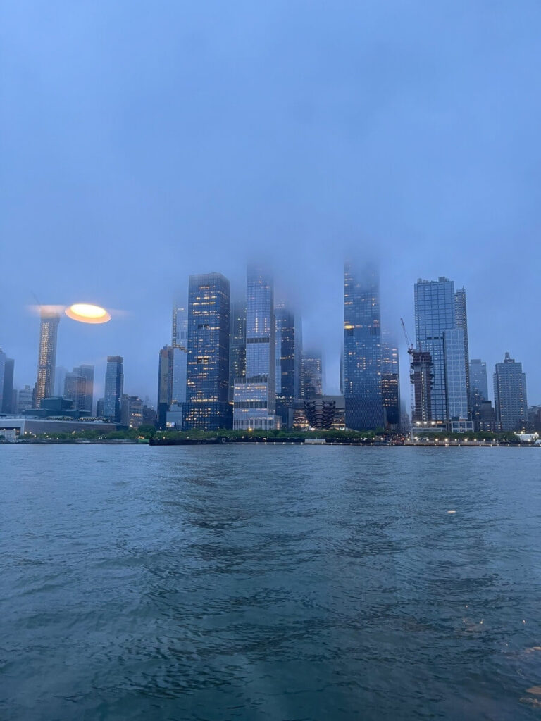 Mist view of the Manhattan skyline from the top deck of the NYC River Cruise
