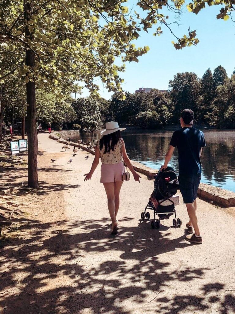 Walking around the storybook lake trail in Centennial Park, a fun thing to do in Nashville with kids. 