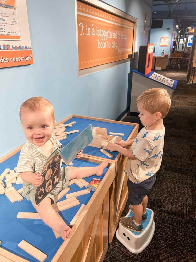 Toddlers playing with building blocks in the Children's Museum of Atlanta.