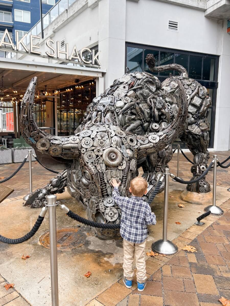 A bull scultupte along the BeltLine, a fun thing to do in Atlanta with kids.