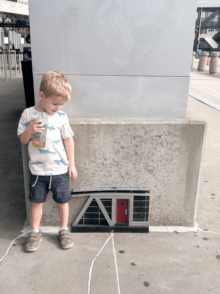 A creative tiny door in Atlanta from the Tiny Doors ATL series, a cheap thing to do in Atlanta with kids.