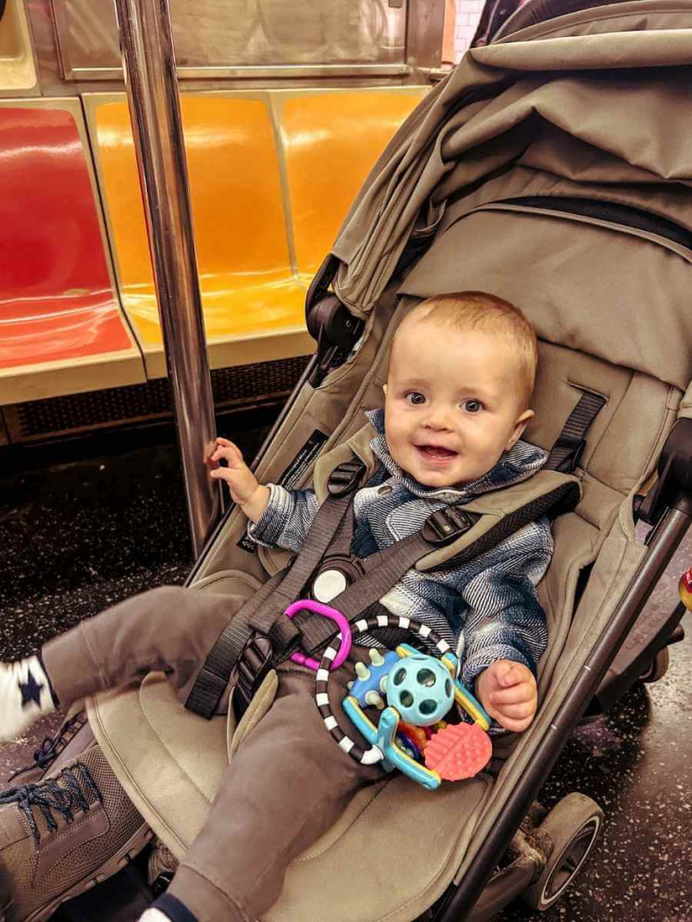 Baby riding on the New York subway - the fastest way to get around NYC