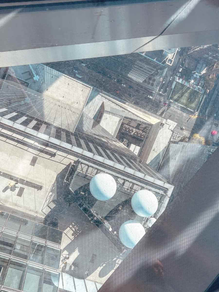 Distant street-level view from The Edge NYC — 100 floors above Manhattan, with limited view directly below