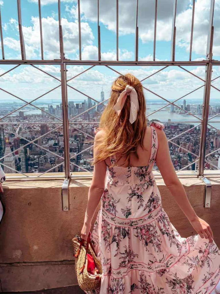 Mum in the City Admiring the view from the Empire State Building — iconic New York bucket list skyscraper experience