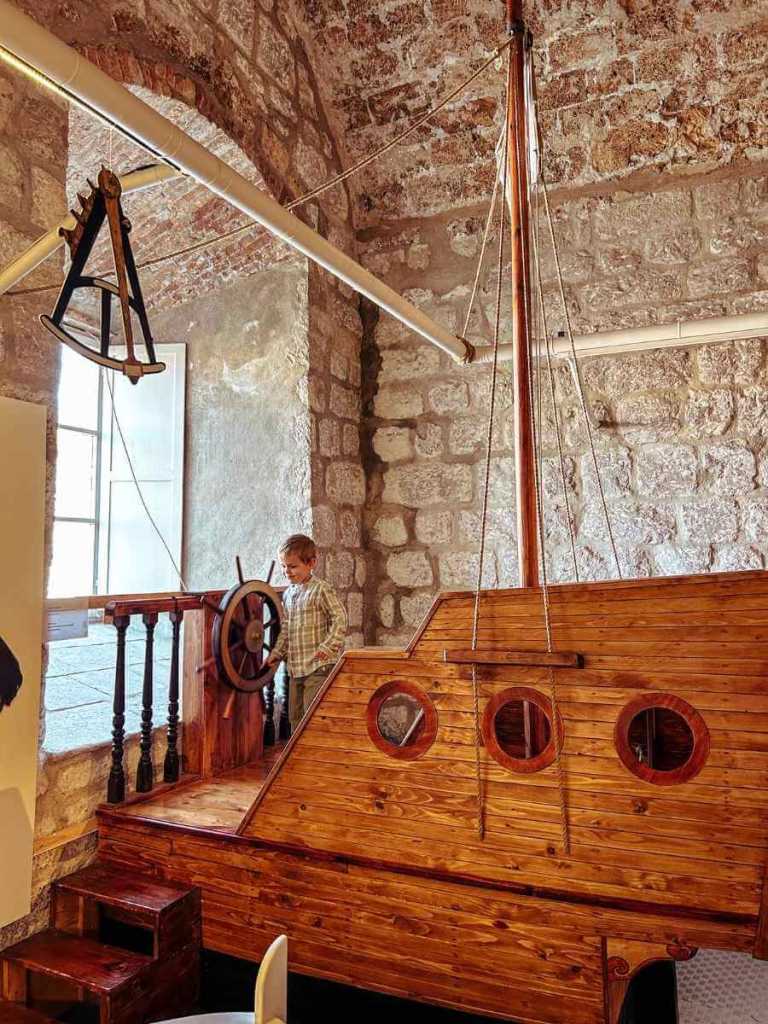 A wooden boat in the Dubrovnik Maritime Museum. A perfect spot for kids to stop and play.