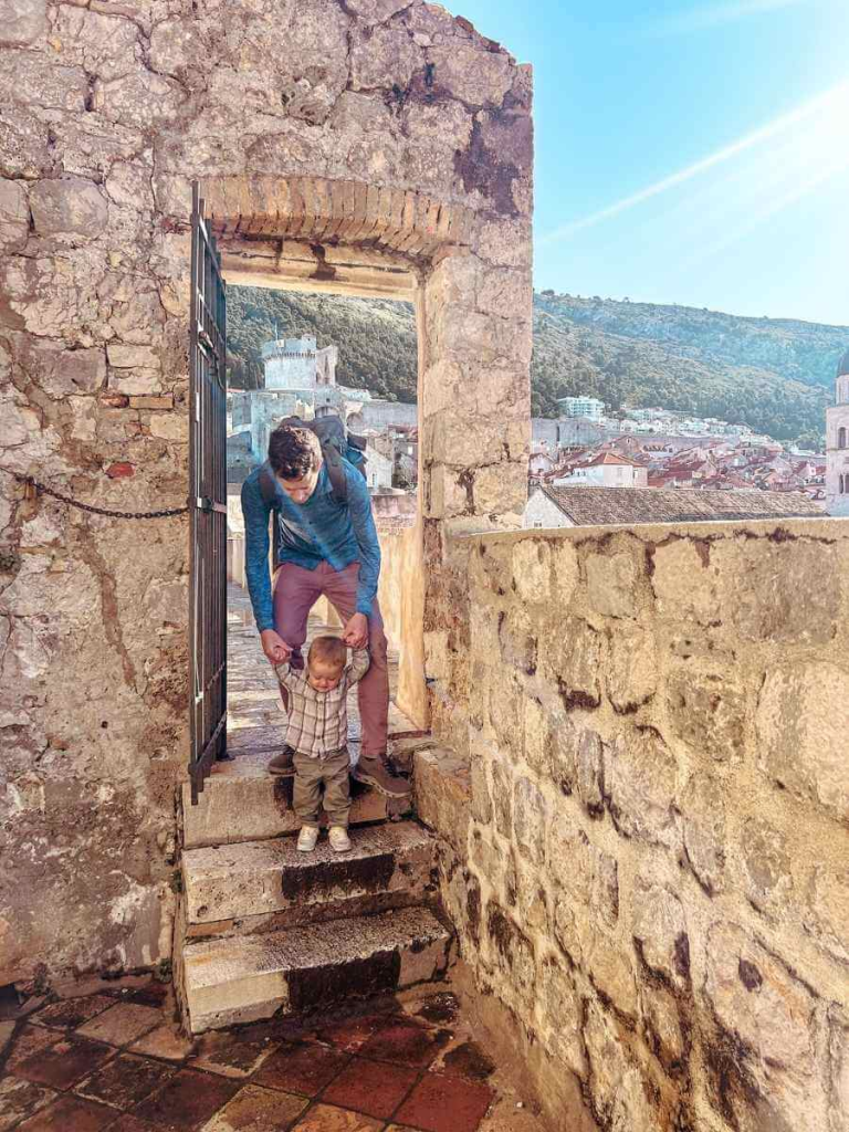 climbing steps on the Dubrovnik City Walls with a toddler