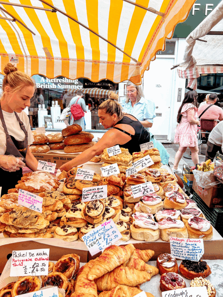 Enjoying the Baked Goods on Portobello Road Market