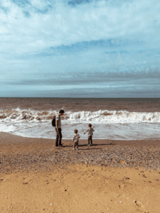 Playing on a family-friendly beach in Faro, Portugal with kids