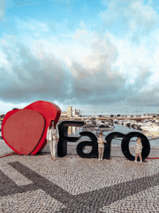 Posing with the Faro Sign as a family