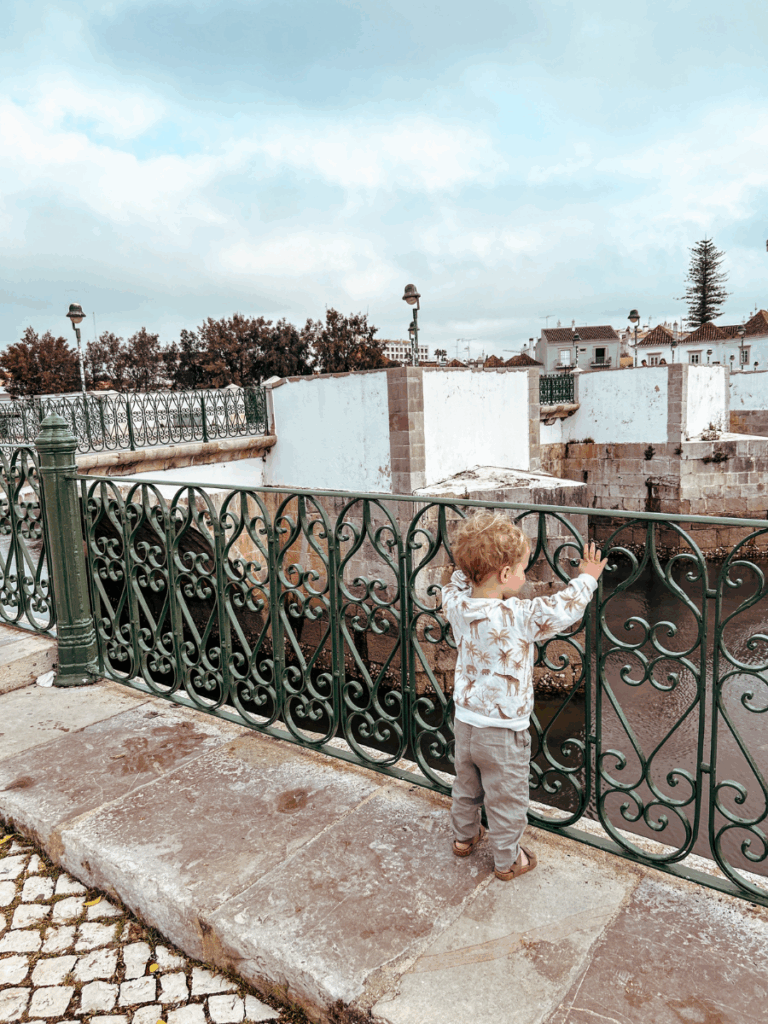 Historic Roman Bridge in Tavira crossing the Gilão River