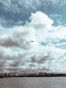 Watching planes from the Faro ferry
