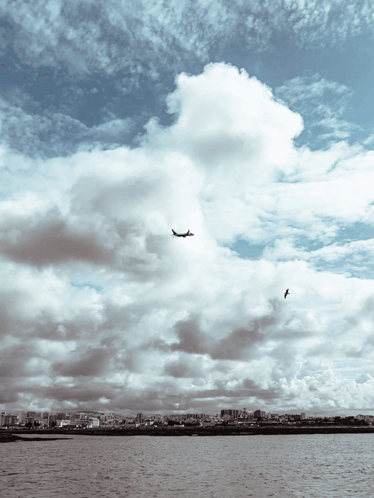 Watching planes from the Faro ferry