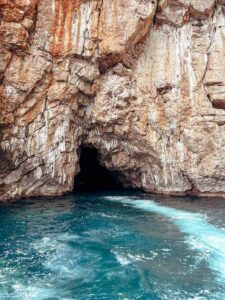 Stunning turquoise waters inside the Blue Caves, a popular stop on Kotor boat tours