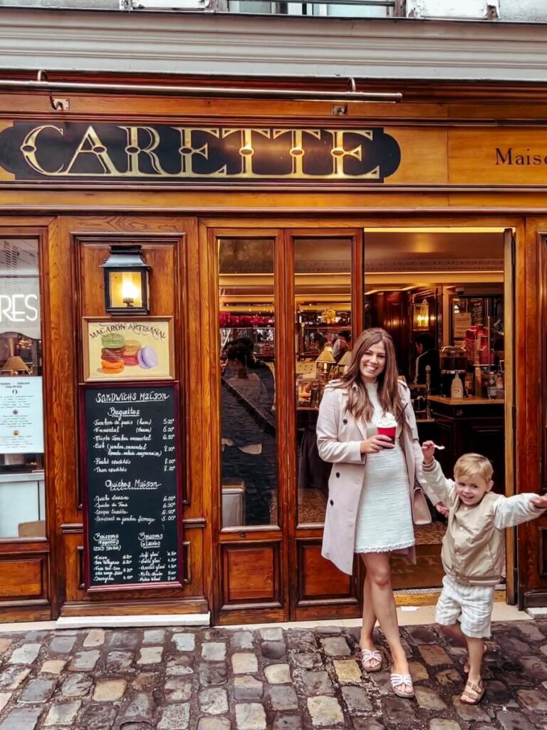 Mother and son enjoying hot chocolate from Carette in Paris’s Montmartre district