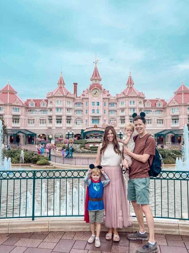 Family photo in front of the Disneyland Hotel, just outside the park gates