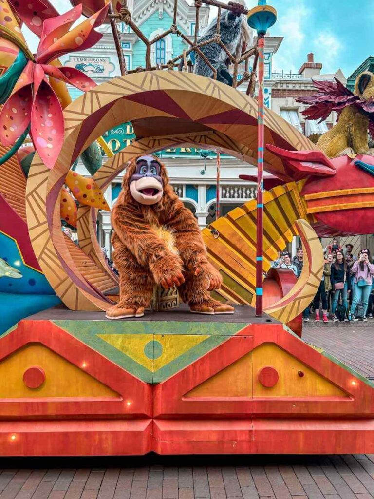 Jungle Book characters on a colourful float in the Disneyland Paris parade – perfect for toddlers to watch.