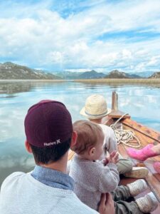 Family enjoying Lake Skadar views from a boat tour in Montenegro with kids