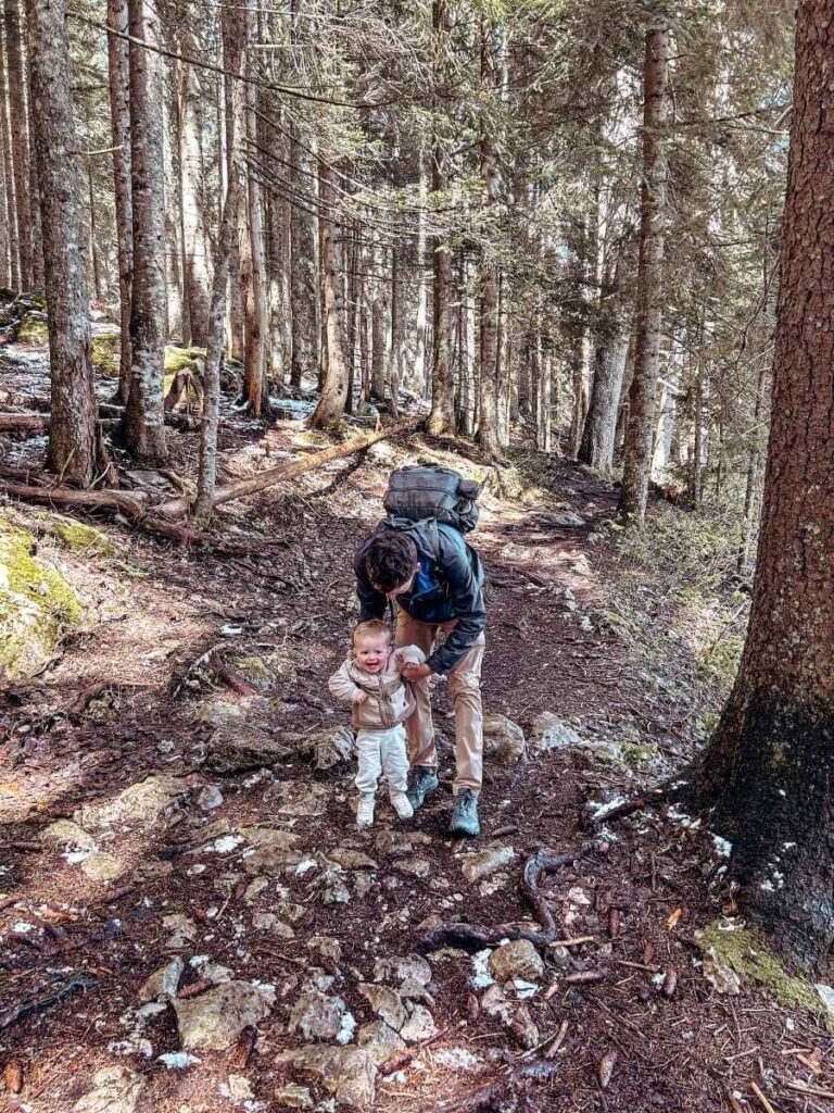 Father and child walking along the circular trail around Black Lake (Crno Jezero), Durmitor National Park