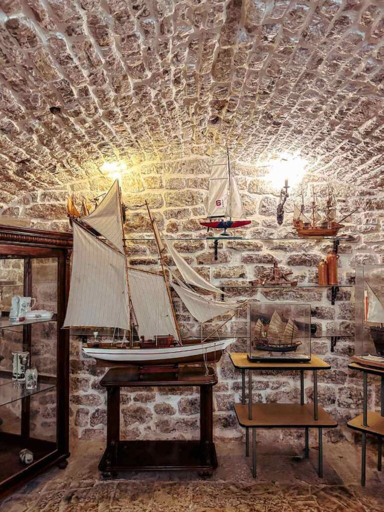 Model ships and maritime artefacts on display inside the Citadel’s museum in Budva
