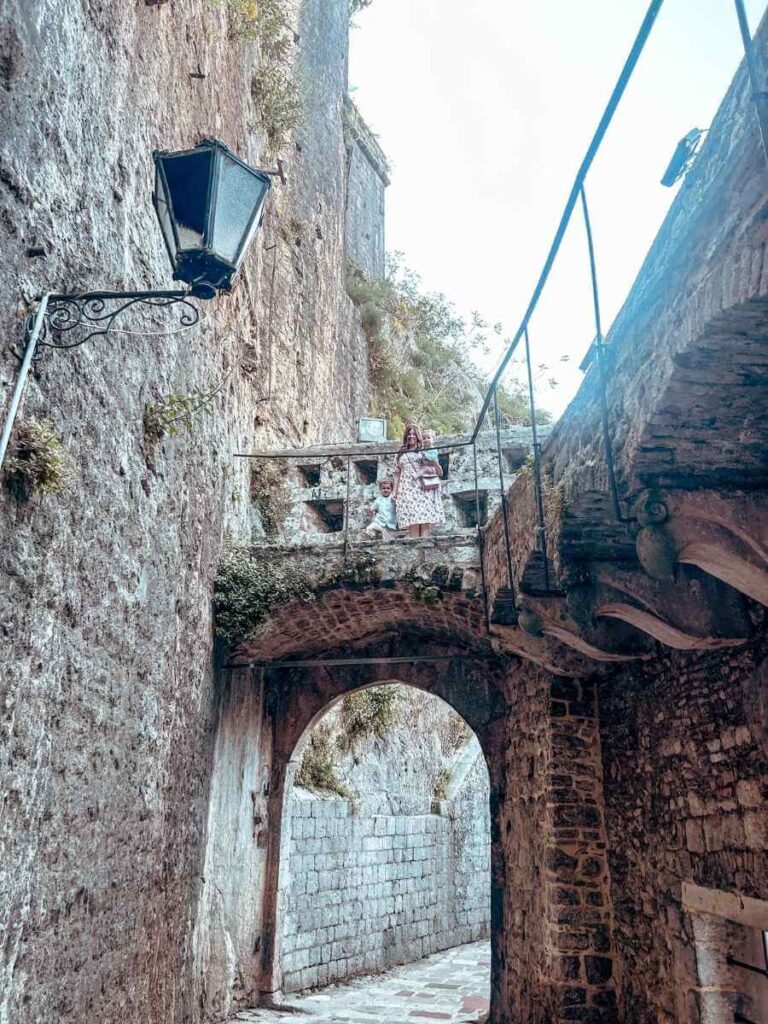 Wandering through the medieval alleyways of Old Town Kotor with children.