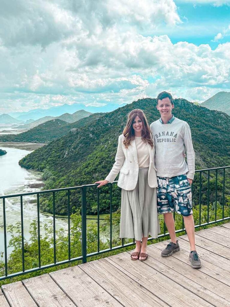 Couple enjoying panoramic views at the Pavlova Strana viewpoint near Virpazar