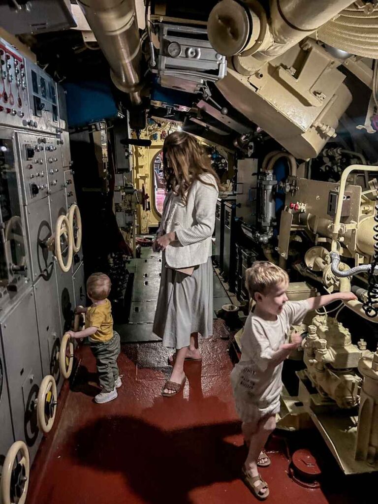 Walking through the narrow interior of the submarine in Tivat