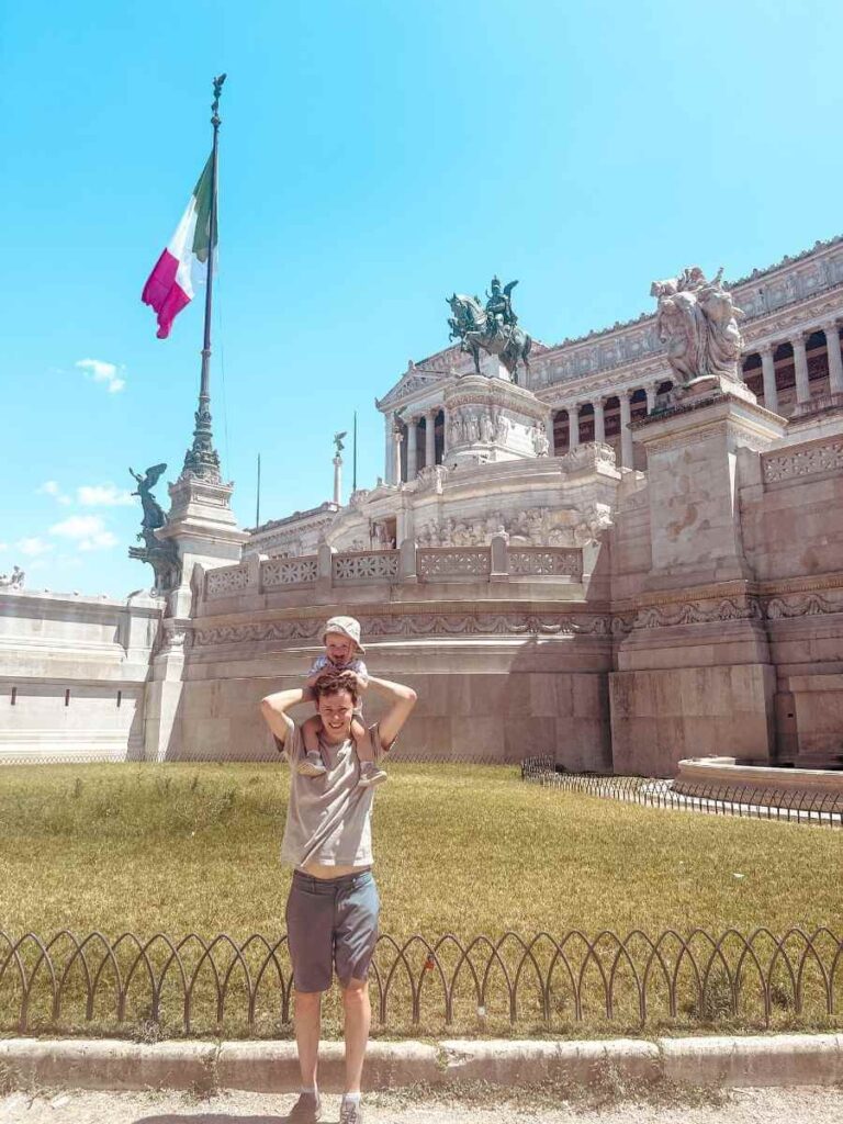 Standing outside the grand white Monument to Victor Emmanuel II in Rome, a top Instagram photo location.