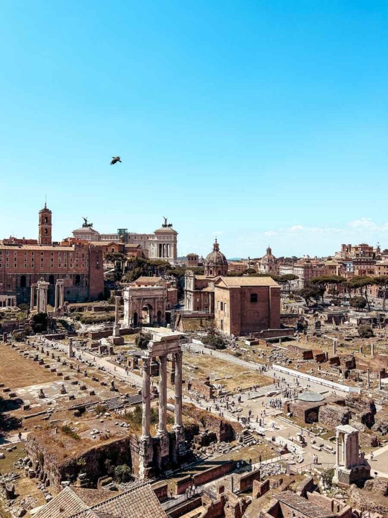 Panoramic view of the ancient ruins at the Roman Forum in Rome, a must-visit historic site and a top Instagram photography spot.