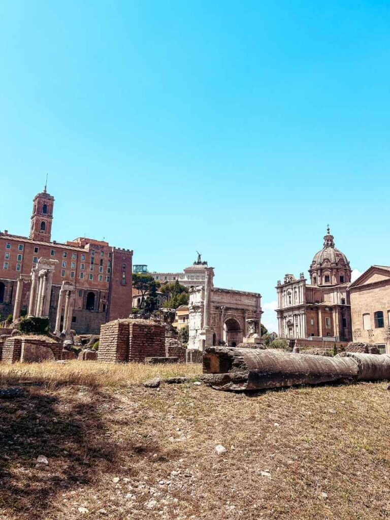 Ruins of the Roman Forum in Rome with ancient columns and stone paths