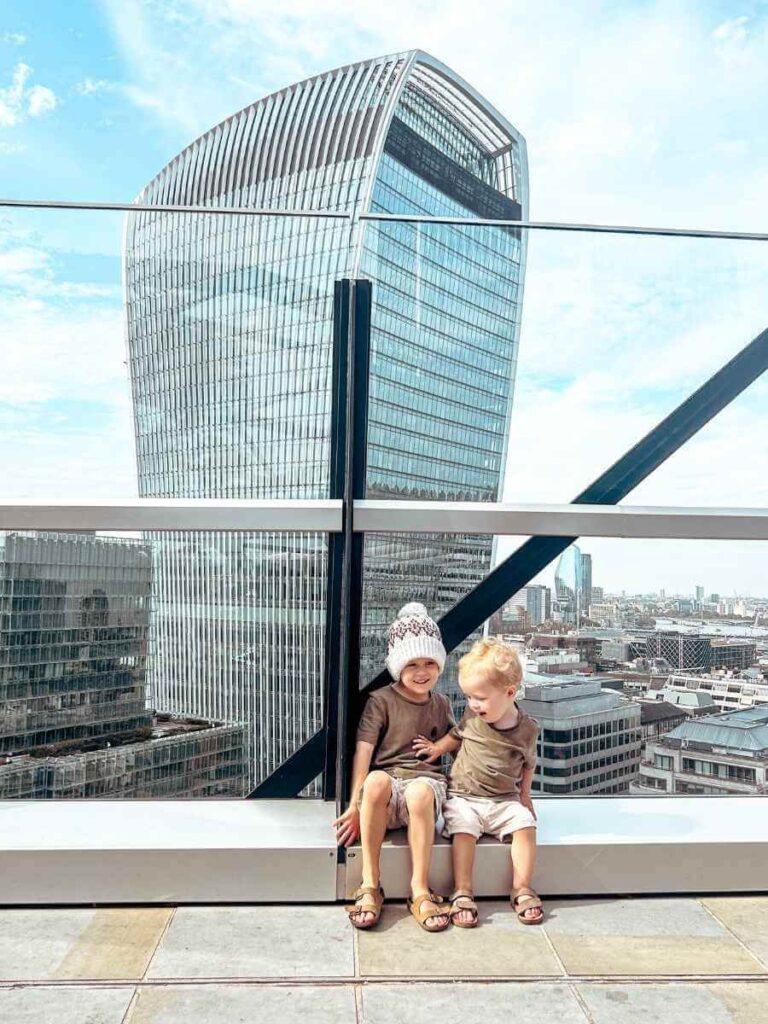 Children enjoying panoramic view of London skyline from the rooftop Garden at 120