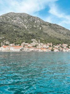 Panoramic view of the picturesque town of Perast from the water during a boat trip