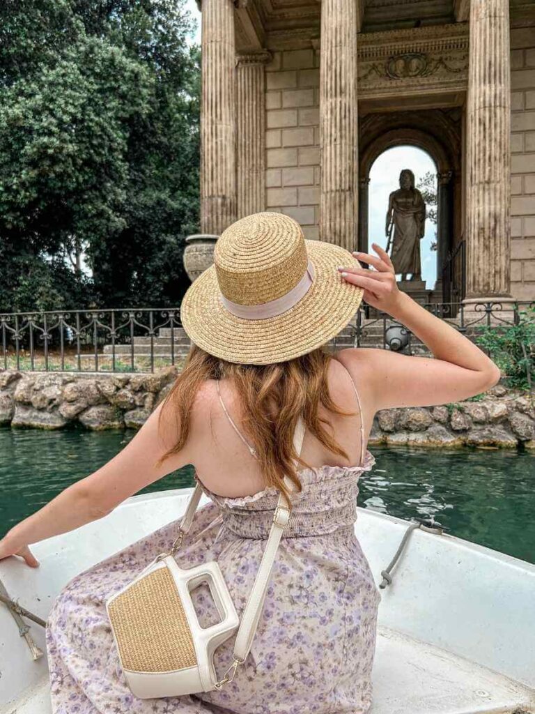 Rowing a boat on the peaceful lake in Villa Borghese Gardens, one of Rome’s most picturesque and romantic Instagram spots.