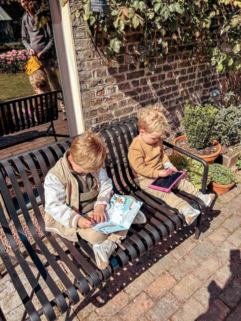 Children completing the Museum of the Home’s family trail activity in the garden
