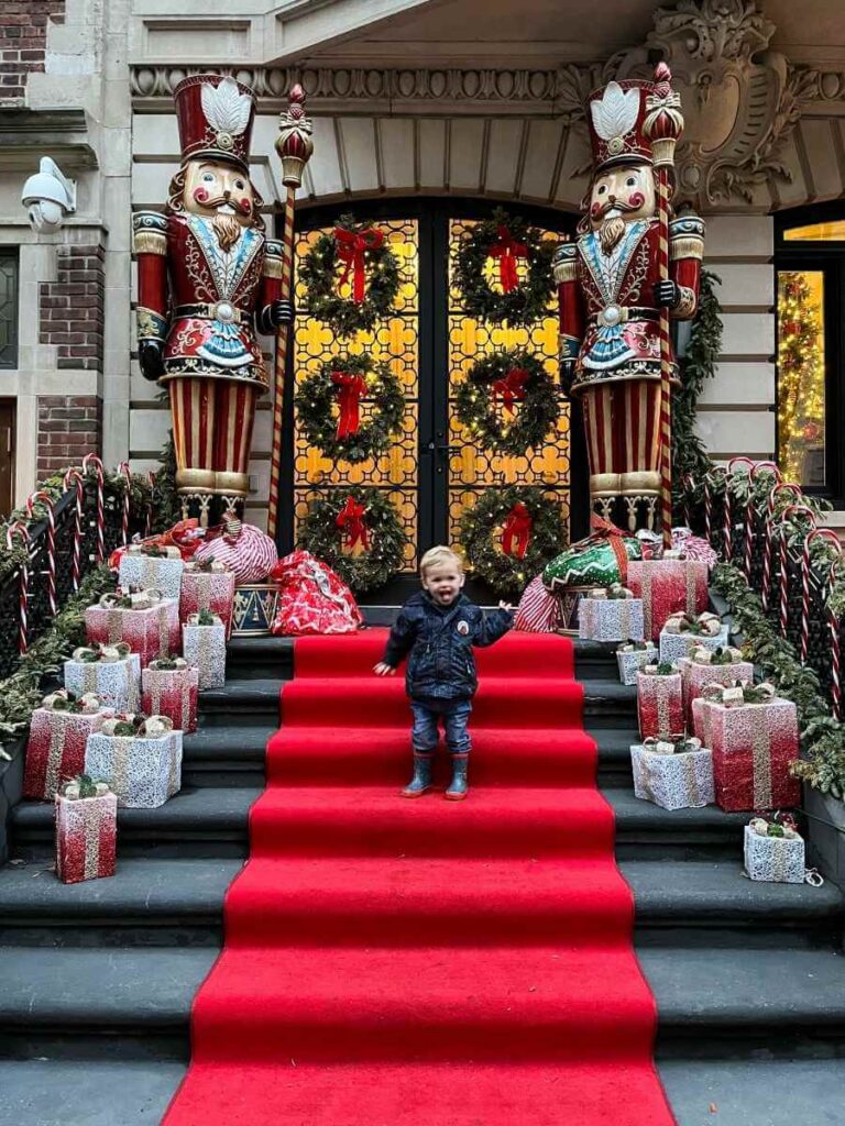 Giant Nutcracker Christmas decorations on East 76th Street in New York, a great stop with kids at Christmas