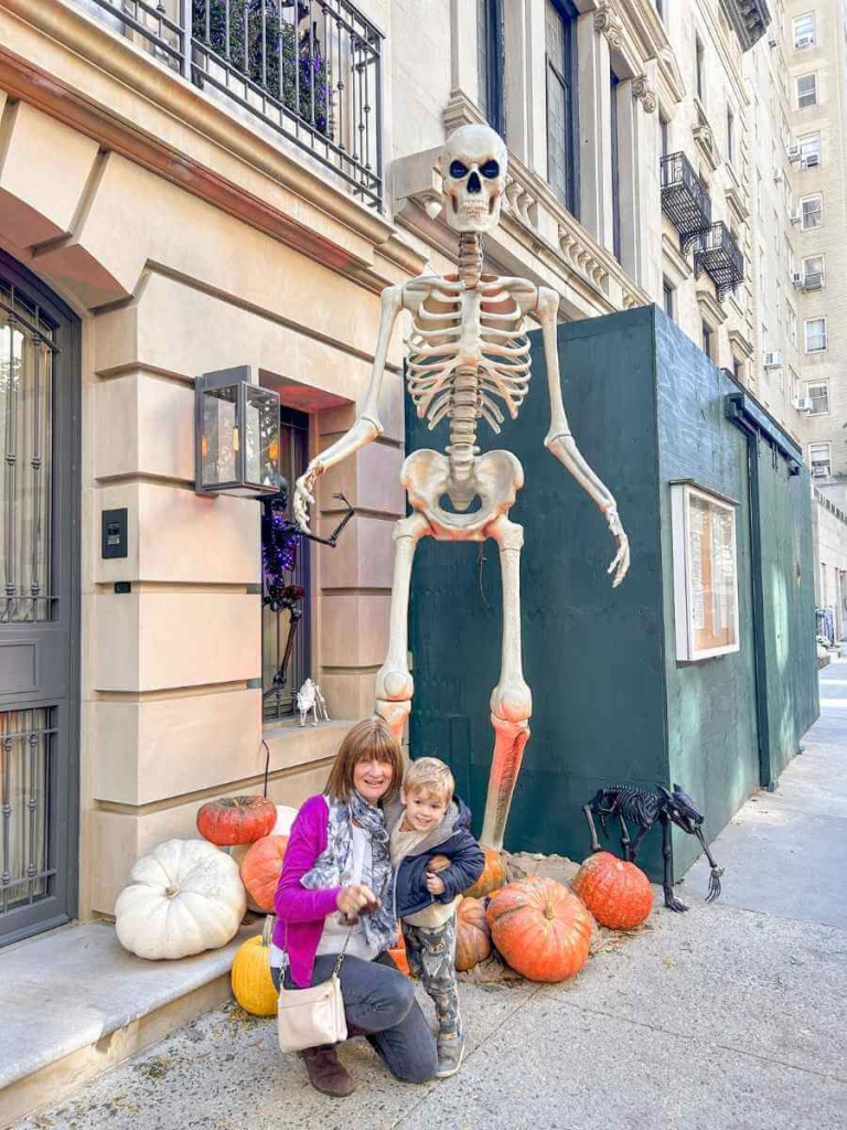 A giant Haloween Skellington outside an Upper East Side townhouse