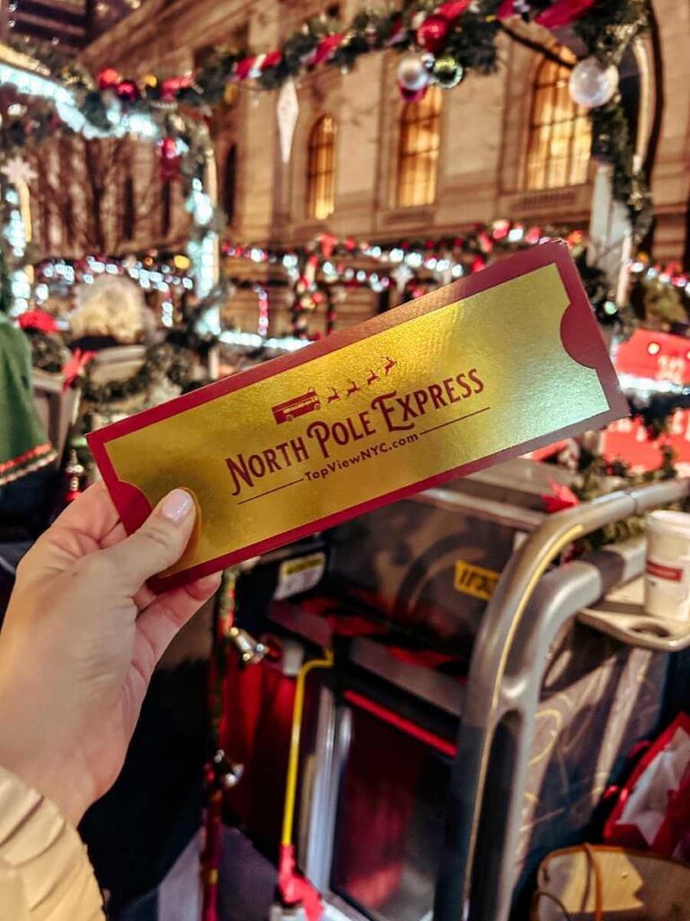 Gold ticket for the North Pole Express, a NYC Christmas-themed bus ride — a fun tour to see the city’s best Christmas decorations.