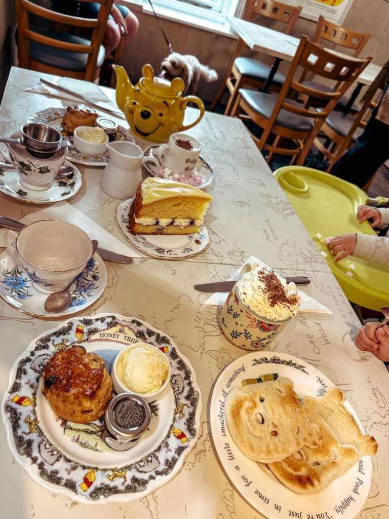 Family-friendly Winnie the Pooh themed afternoon tea served at Pooh Corner tearoom in Ashdown Forest