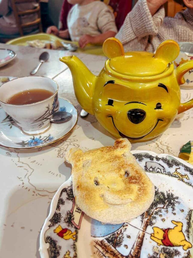 Winnie the Pooh-shaped teapot and toast at Pooh Corner cafe in Ashdown Forest