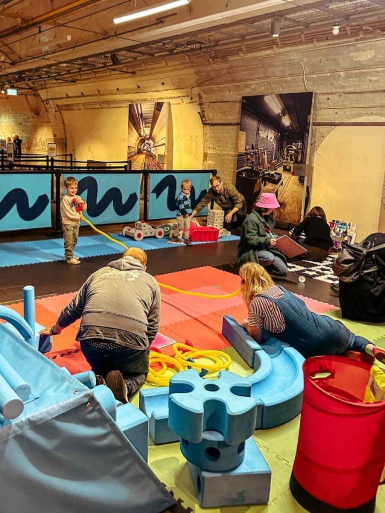 Overview of the Post & Play toddler area at The Postal Museum, designed for young children.