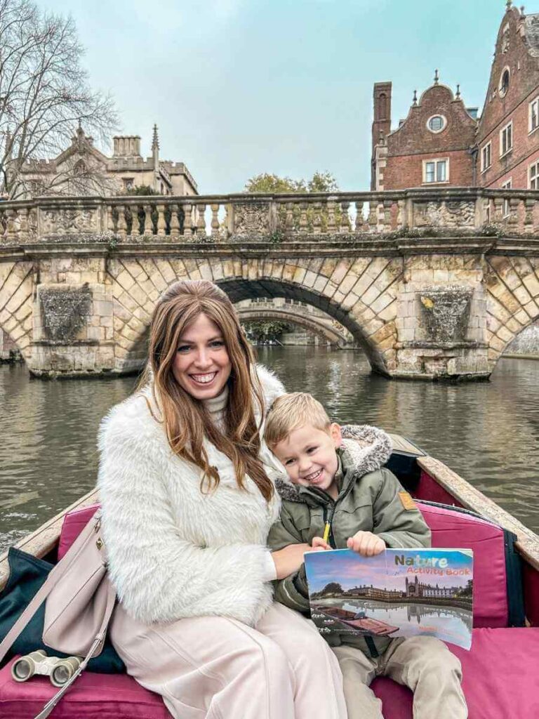 Mum in the City and her son punting on the River Cam – one of the most iconic things to do in Cambridge with kids.