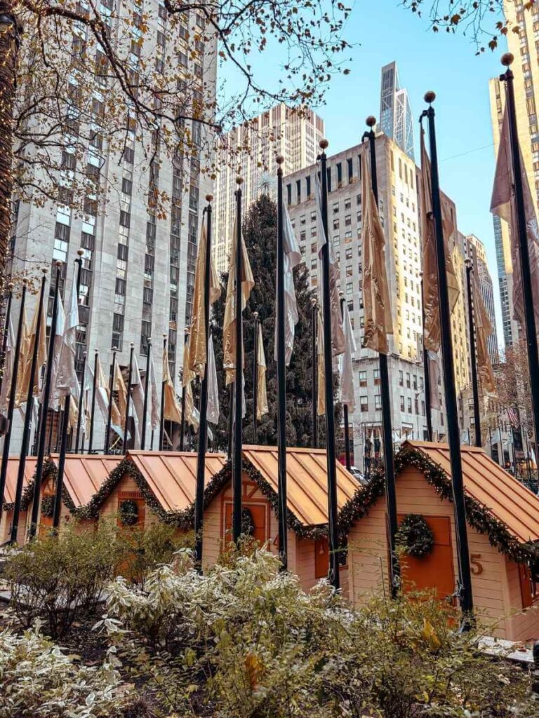 Christmas chalets at the Rockefeller Holiday Market, one of the best places to shop in New York at Christmas.
