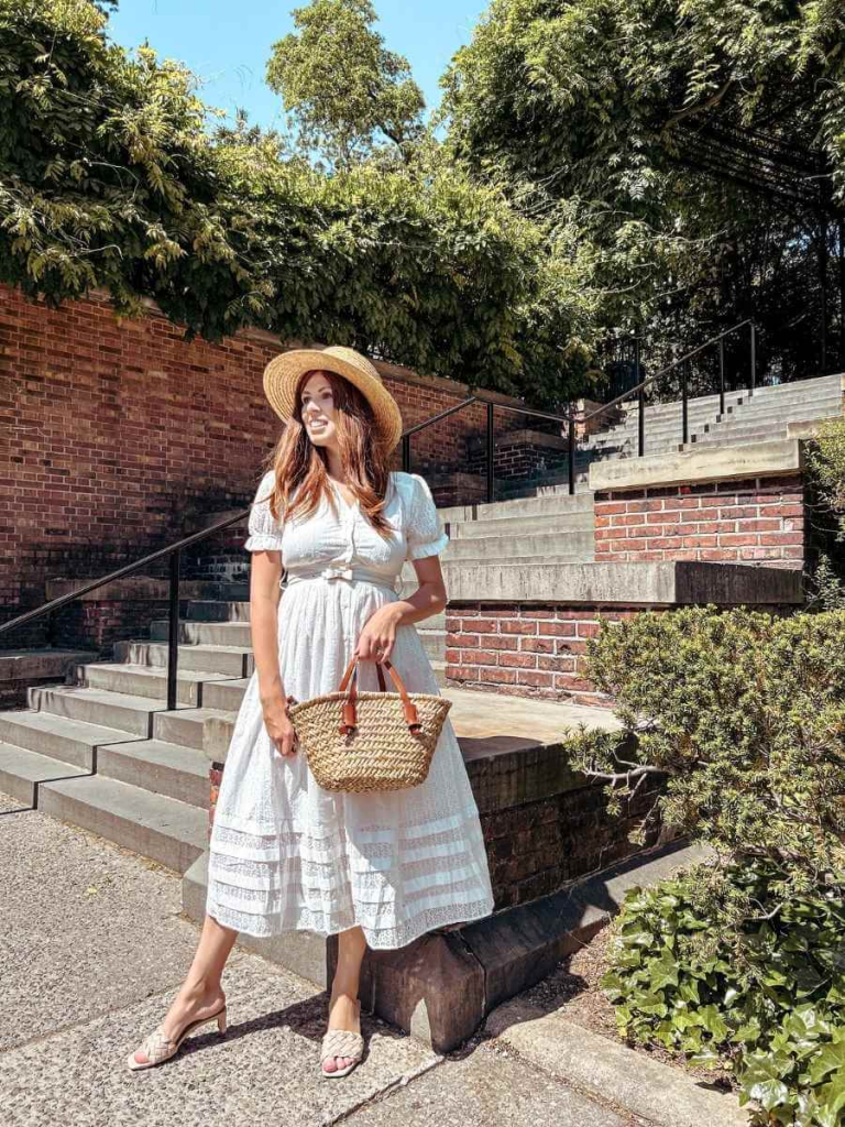 White midi dress ideal for a spring or summer feminine capsule wardrobe — lightweight, elegant, and effortlessly stylish.