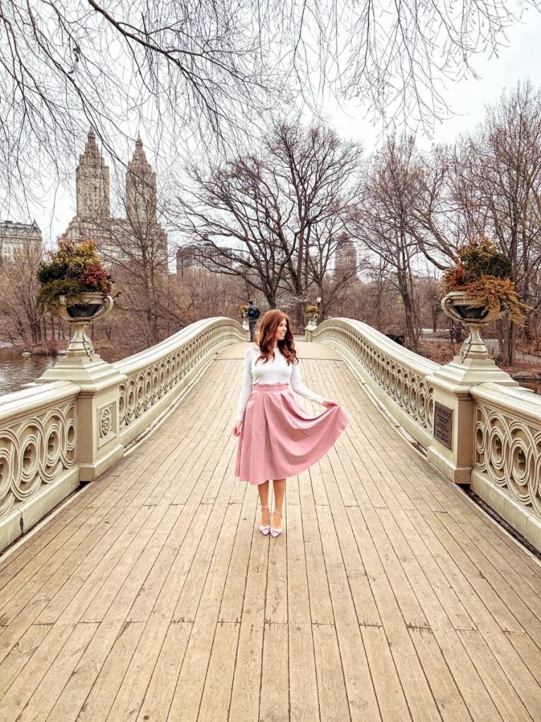 Walking across the middle of the Bow Bridge, one of the most Instagrammable places in New York City.