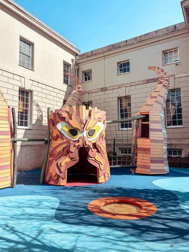 the Kraken sea monster climbing frame sculptures at the Cove Playground at the maritime museum for kids.