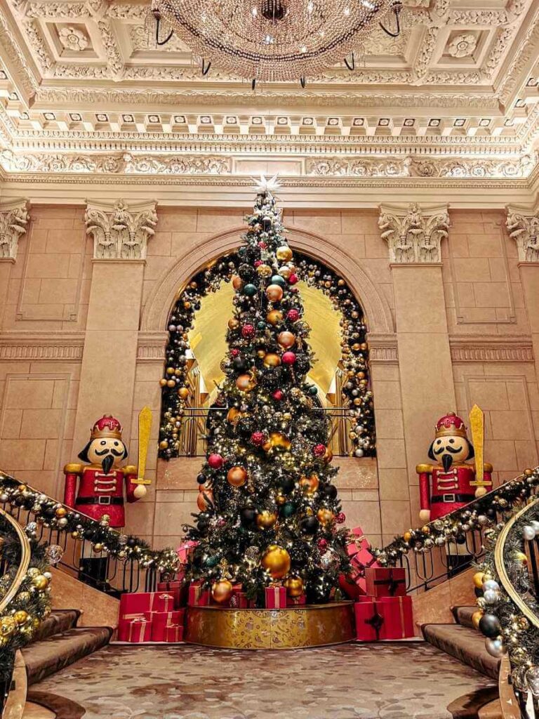 Elegant holiday tree and garlands at The Peninsula New York, beautifully decorated for Christmas in NYC.