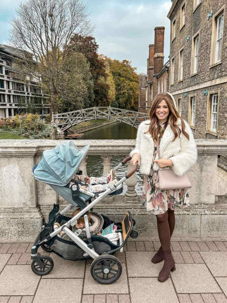Standing with the UPPAbaby Vista — a stylish, full-featured pushchair worth considering when buying your first stroller.

