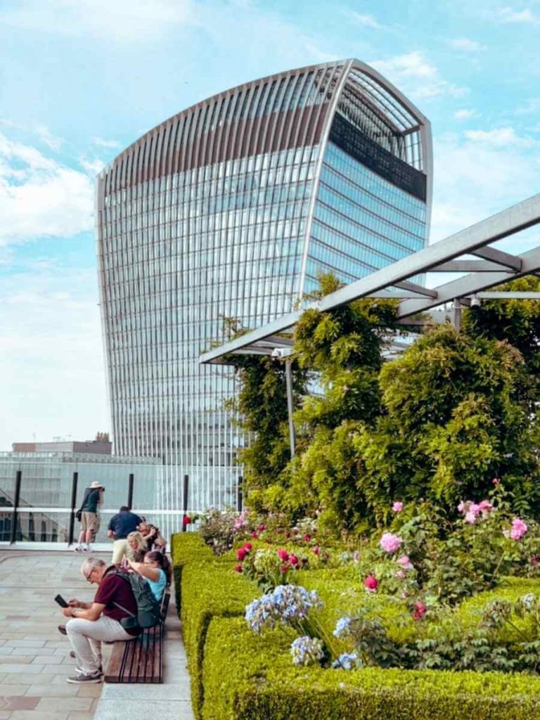 The Garden at 120 rooftop with the Sky Garden visible in the London skyline background