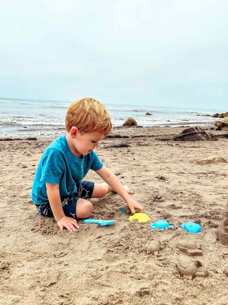 Toddler Playing on Arroyo Burro Beach in Santa Barbara
