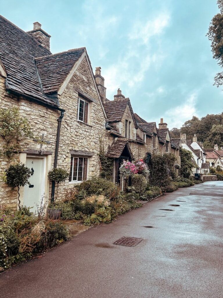 A beautiful street in Castle Coombe, one of the best places to visit in the Cotswolds.